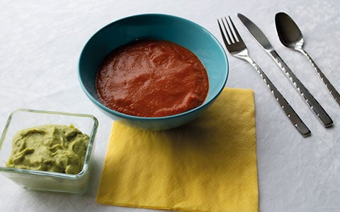 Tomatoe Soup In A Bowl In Table 